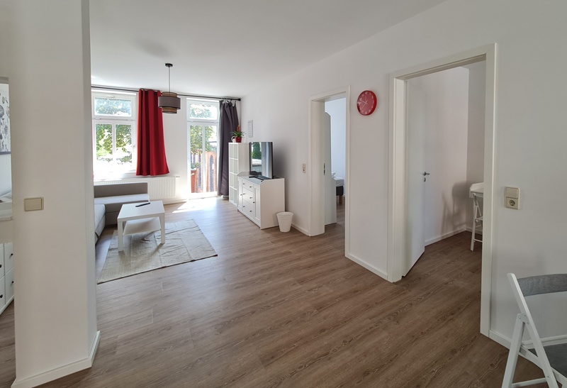 Wohnzimmer im Appartement 31 der Cityappartements am Bauhaus in Weimar